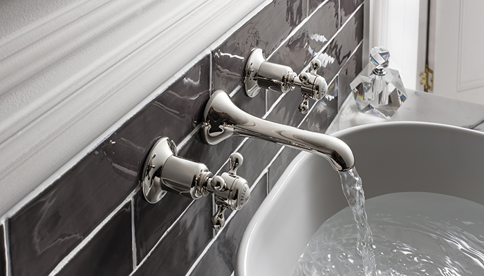 Featuring crosshead levers for a traditional aesthetic, Crosswater’s Belgravia wall-mounted three hole basin set comes in Chrome, Nickel, pictured, or Unlacquered Brass, which is described as a natural living finish 