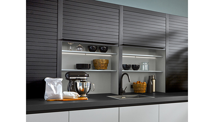 Tambour units offer a lot of flexibility for organised storage – homeowners can have items within easy reach and then tidy them away easily, creating neat design lines and keeping the worksurface clutter-free. Pronorm has recently introduced a range of sizes in a tactile matt black finish which, when designed as a bank of units, creates a very stylish aesthetic