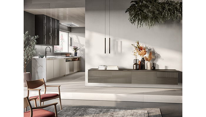 Designed to offer a ‘total living solution’, Scavolini’s Libra collection is perfect for open or broken-plan designs. Featuring Cuvée ribbed glass doors with a 1.2cm-thick Cuvée matt glass top, the living room furniture seen here blends beautifully with the kitchen units 