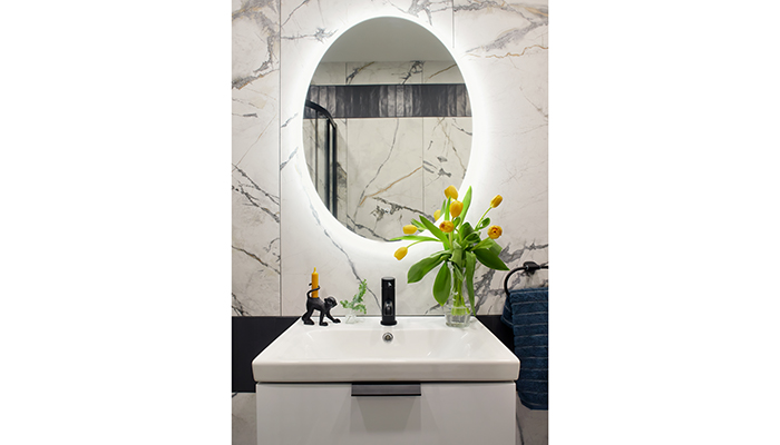 Operated by touch controls, the Sansa oval mirror has LED lighting and a heated demister pad 