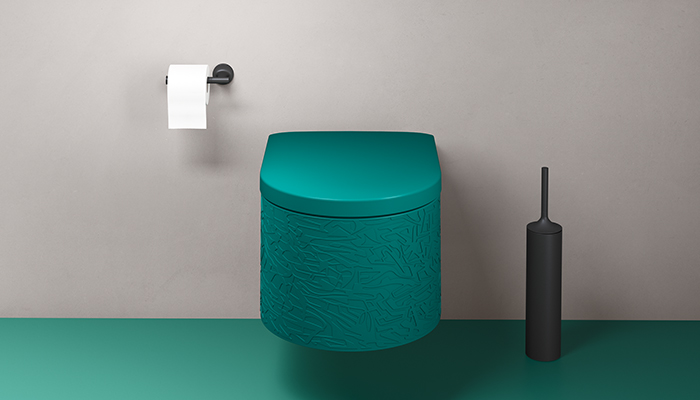 Created to co-ordinate with Duravit's colourful Vitrium washbasin series, the Millio toilet designed by Antonio Bullo uses resonant jewel tones combined with two surface textures – a grooved and patterned relief – and features a ceramic toilet body and a panel made from the brand's DuroCast material