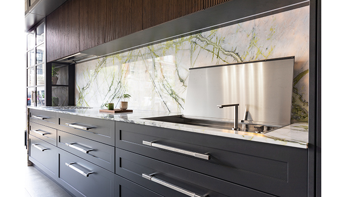 Lab hob with stainless steel support grids and Lab sink with cover and B_Free telescopic tap with remote control, shown with Neil Norton Design furniture