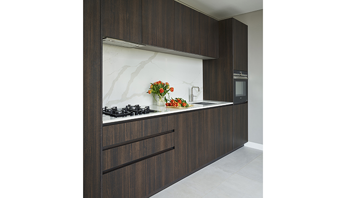 As part of this London project, DesignSpace London were also asked to design a bespoke ‘spice’ kitchen. A simple, practical space, it acts as a back-up when the family are entertaining on a large scale, ensuring messier tasks can be carried out without disturbing their guests. Providing a cohesive visual link with the main kitchen, the design also features a mix of wood, metal and quartz