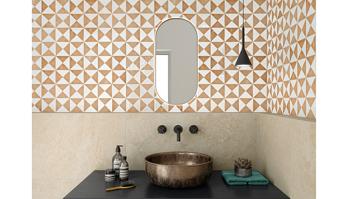 The new Sunset collection from Ceracasa, shown here in Terracotta and available in a broad selection of sizes, features a handmade 'vintage' aesthetic – the geometric pattern looks particularly striking when combined with a stone-effect tile