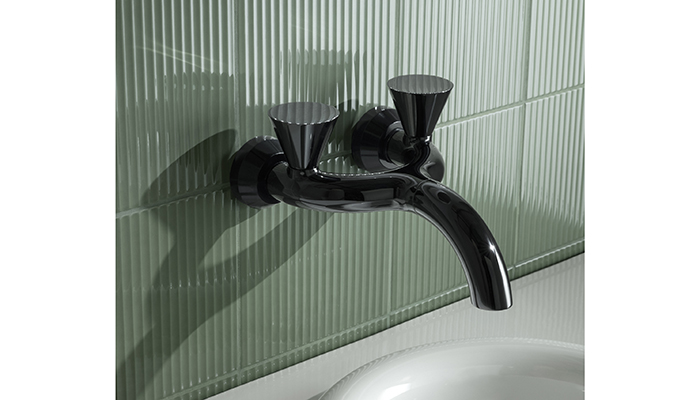 This unique Liquid wall-mounted mixer tap in glossy black from Tom Dixon and VitrA is the perfect statement tap with sumptuous rounded edges in a timeless design for customers looking to add a fun sculptural piece to their bathroom