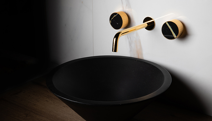 Chiasso is the new basin and shower mixer range from BagnoDesign. This standout gold-finished spout looks beautiful alongside the gold fluted handles with elegant porcelain details