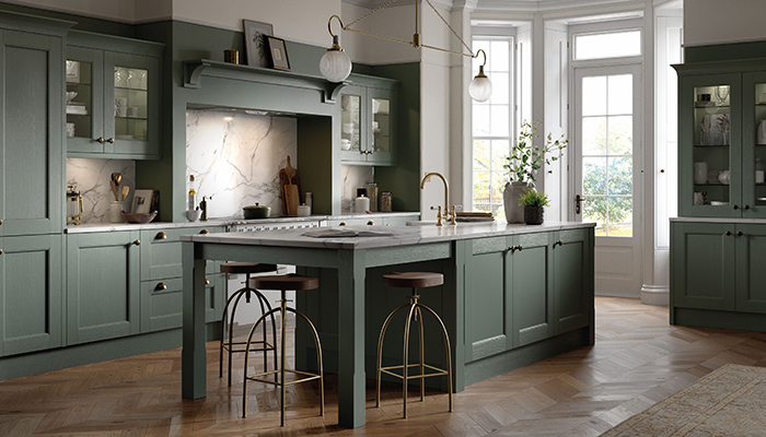 The Mackintosh kitchen from Omega is a Shaker-style design with a narrow frame and a subtle woodgrain finish, painted in Manor House botanic green with 19 door styles and 22 painted colours, giving customers plenty of choice