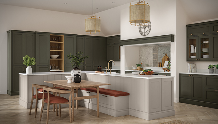 A classy kitchen design that will appeal to a broad customer base from Masterclass kitchens, using the complementary earthy tones of Hardwick New Forest green and Highland Stone on the L shaped island, with a pop of burnt orange on the island banquette seating