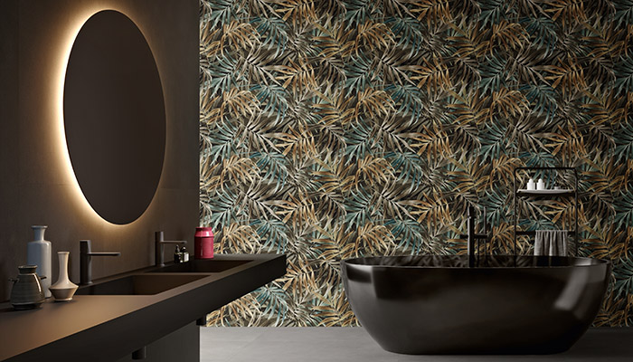 Saint Jardin Jungle Porcelain – the latest addition to tile and stone specialist Lapicida's portfolio – features a vibrant pattern of wild jungle leaves against a midnight background, a design that's perfect for creating statement feature walls