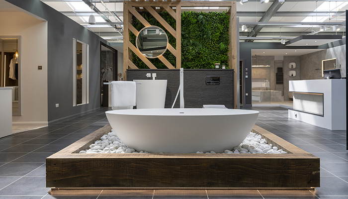 A freestanding tub from Waters Baths of Ashbourne takes centre stage in the showroom. Also pictured is Hansgrohe’s Metropol freestanding bath shower mixer and wall-mounted tap