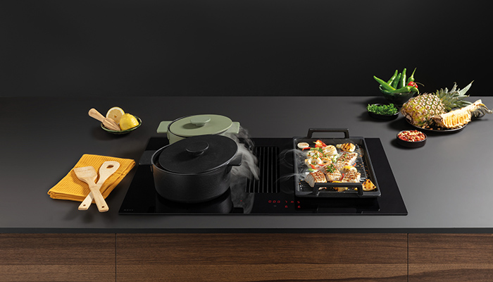 Featuring an integrated cooker hood, the Novy Easy Pro Intuitive 80cm Vented Induction Hob has four cooking zones, two of which can be combined with the bridging functionality 