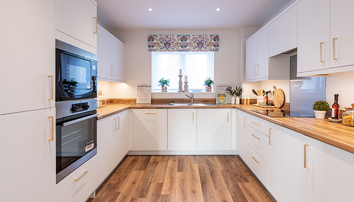 These compact kitchens have been designed with the health and safety of their residents in mind using Symphony Kitchens ‘Freedom’ range, providing lower worktops and a replacement door service to increase the longevity of all kitchens in the village