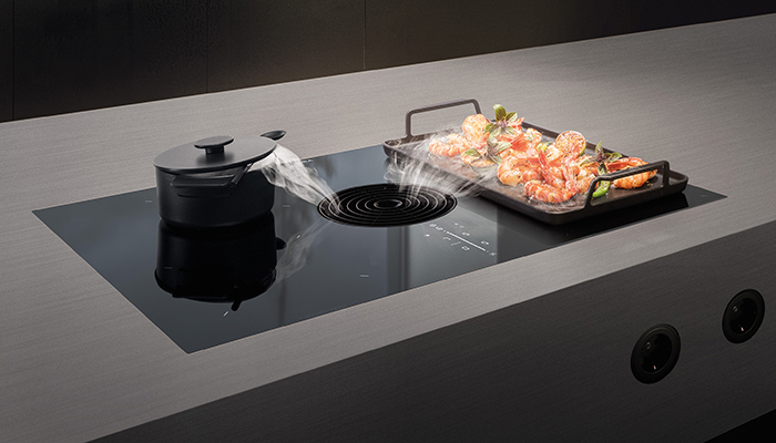 The new A-rated BORA M Pure is the most flexible of the brand’s compact cooktop extraction systems yet. The 2 surface induction zones on the right can be connected together by the bridging function to create a large zone. It offers 9 extraction speeds with noise levels ranging from 28dB to 54dB