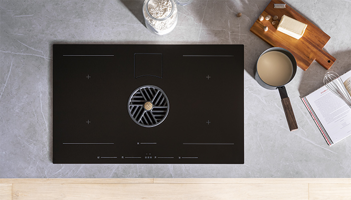 Bertazzoni’s P804ICH2M37NT 80cm induction hob with integrated hood is rated A+, has a maximum air extraction rate of 640 m3/h, and a maximum noise level of 66dbA. The hood has 5 speed selections, and the Automatic function will adjust the speed of extraction based on the power used during cooking