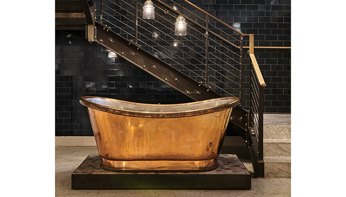 The Clothilde copper tub on display in the lower ground floor of the showroom