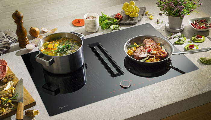 Neff’s N 90 induction hob with integrated ventilation, has an Automatic Air Sensor which will keep track of the air quality and automatically adjust the power level of the extractor to keep the air clear. With the Power Transfer feature, when the user repositions a pot the settings automatically follow the cookware
