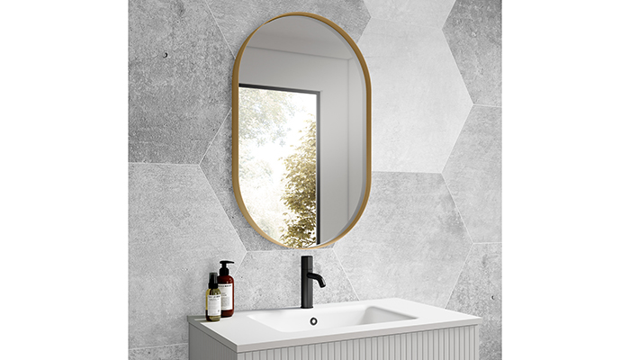 The Liora mirror is finished in brushed brass 