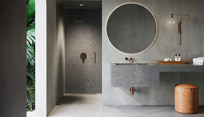 Designed for the perfect fit in any space, CRL bespoke showers use high quality minimalist hardware for the latest in frameless showering. Shown above is Prima Antique Brushed Copper Meteroa Gris Cosmopolitan grey