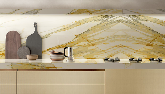 Calacatta Mediceo is part of the new Naurali Series by Laminam and has distinctive gold and grey veining on a warm cream background. Its large-scale pattern looks stunning on kitchen islands and splashbacks