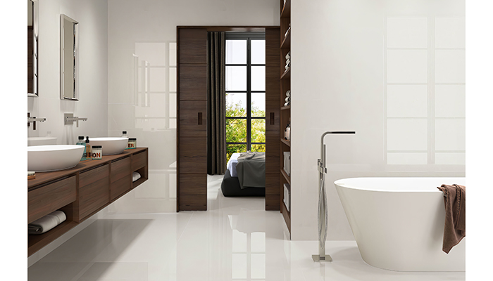 Featuring a striking NeoGloss surface for a beautifully polished finish, our new Trevi 1822 White Polished floor tiles have been used in this bedroom bathroom to blend the boundaries in contemporary design. Made from rectified porcelain, these replicate the look of natural stone with absolute finesse