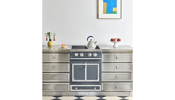 La Cornue's Castel 60 range cooker in Graphite has an induction top and is available in 40 colours as well as in bespoke hues with 16 metallic trim options, giving designers as much freedom with palettes as they would have with larger models