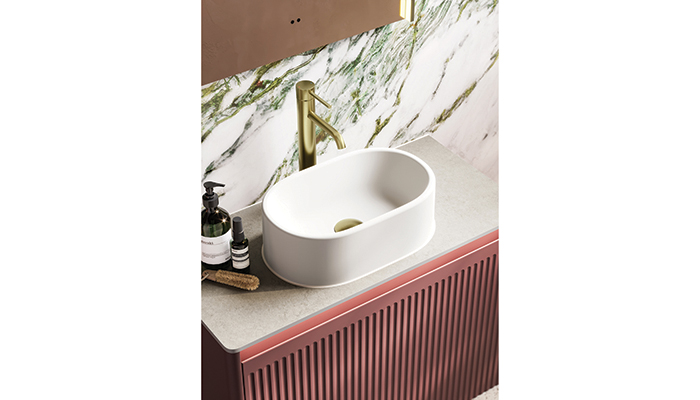 The Adorn washbasin unit from HiB comes in Olive, Mushroom or Terracotta, shown here, and features a metal drawer box with soft-close runners for gentle closure. It comes in 60cm and 80cm widths and an optional LED underlight 