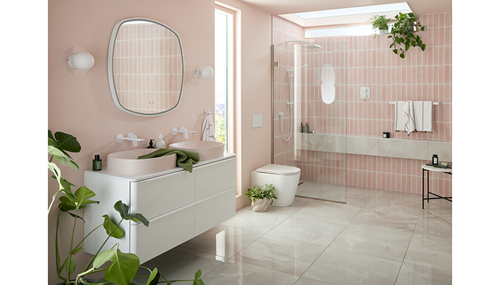 The 1200mm-wide Cameo wall-hung vanity unit with four drawers is seen here in Arctic White with Mineral Oval countertop basins in Pink Clay. Matt White brassware completes the look