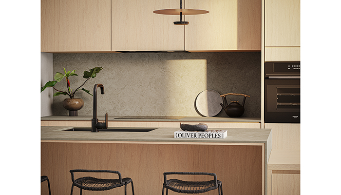 Caesarstone’s 542 Mosstone surface captures the essence of gently weathered rock, offering comfort and organic charm. Its satiny gleam, subtly embossed and irregular in depth, provides a soothing touch