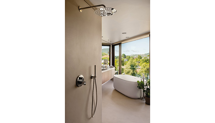 The clever orientation and full-length windows in the master bathroom mean that the view can be enjoyed from the shower and bathtub