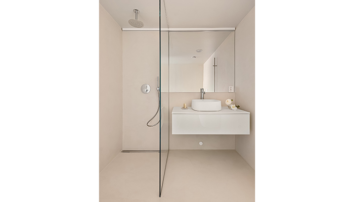 Each bedroom has its own bathroom where the Zencha above-counter basin with matching vanity unit in White creates a gentle contrast to the wall and floor coverings in light beige