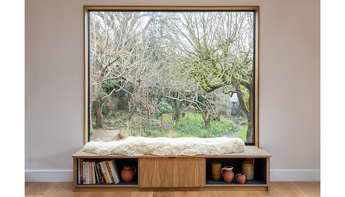 This bespoke bench seat is designed to maximise the garden views