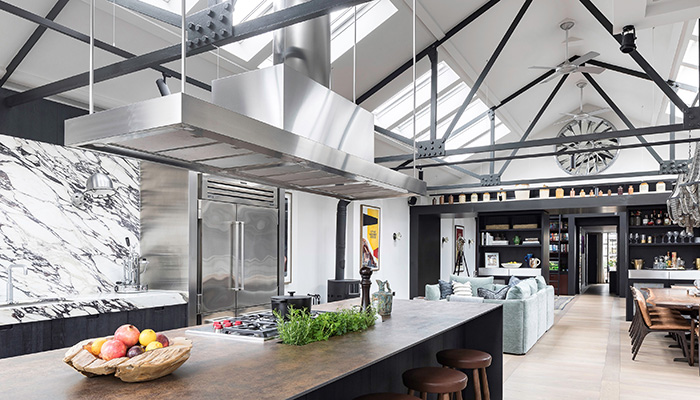 Overhead statement extractor in stainless steel in a kitchen project by Oli Moss of Roundhouse Design