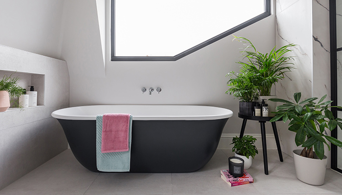How Simply Bathrooms worked with light and dark tones in an open space