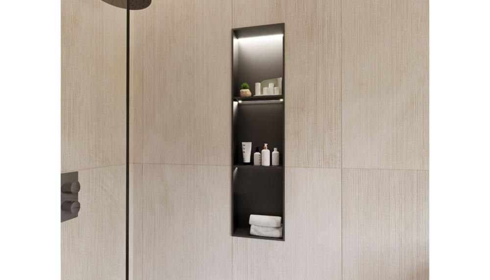 The RAK-Ingot stainless steel recessed niches are available in Black, Brushed Brass, and Brushed Nickel. They come in sizes of 30 x 30cm, 30 x 60cm, 30 x 60cm with a dividing shelf and integrated LED lighting bringing a layer of ambient illumination into the shower area