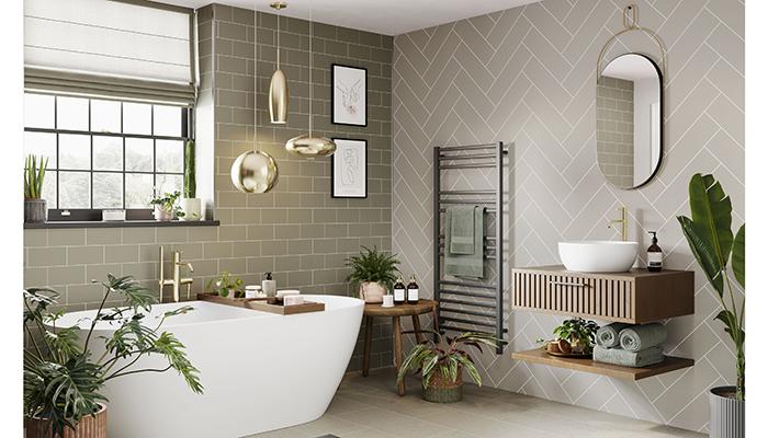 Replicating the look of popular subway tiles, Multipanel’s Sage Green Metro Tile panels offer the elegance of classic tiles and are perfect for consumers looking to create biophilic bathrooms. Also pictured are Taupe Grey Herringbone panels