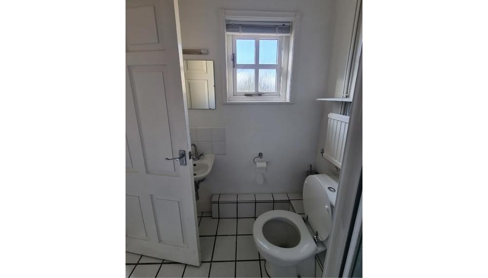 The bathroom was originally dark, cramped and dilapidated