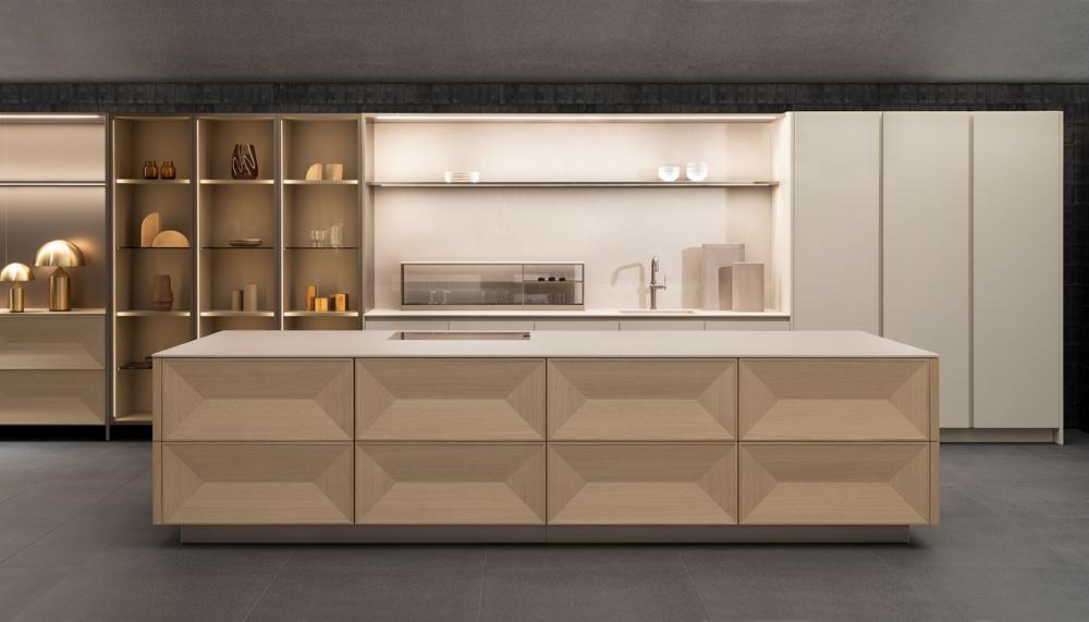 Designed to make a sculptural statement, Poggenpohl’s new TAGLIO kitchen features three-dimensional fronts arranged like the facets of a diamond