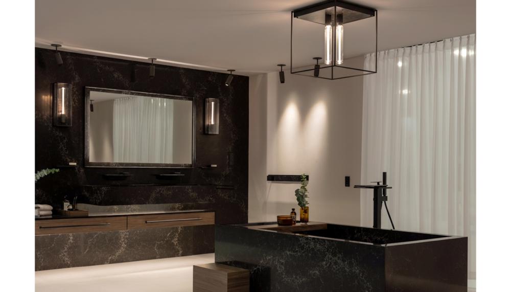 Buster + Punch x GROHE SPA is the result of a new collaboration between Grohe and Buster + Punch, which offers a fully integrated bathroom collection of brassware, lighting and hardware. Seen here in black are Buster + Punch’s Caged Wet Wall and Ceiling lights, which pair perfectly with GROHE SPA’s Phantom Black finish