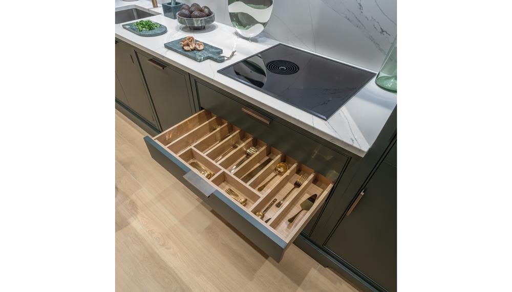 Cock-bead detailing frames the drawer stack