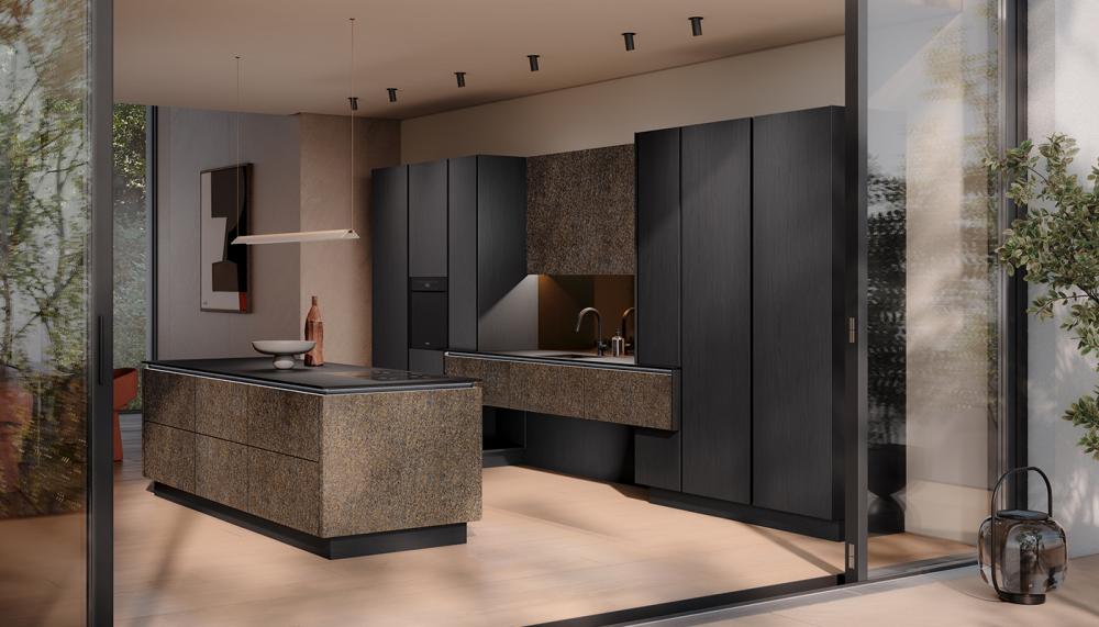 Häcker presented its latest launches at its revamped in-house showroom during Hausmesse last month, including the new ‘Gold Shine-star’ stone veneer front shown here in a scheme that is minimalist but exudes warmth