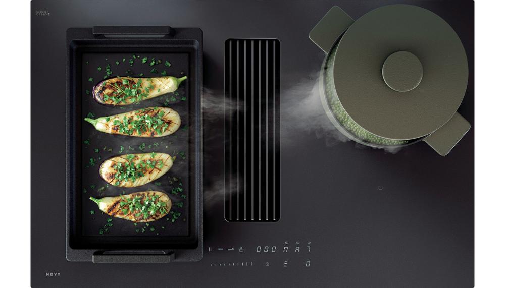 Novy’s Easy 80 Matte Line is an 80cm recirculation vented induction hob, which features a Matt Black glass surface with stylish white slider controls. Its 4 zones that can be bridged to become 2 larger zones on either side of the central matrix vent