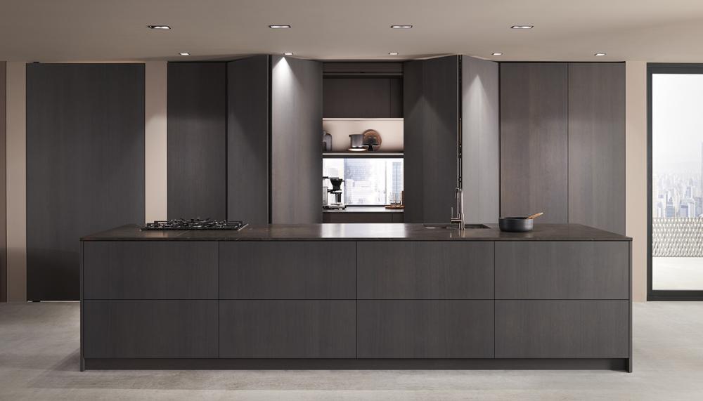 Blum launched its REVEGO pocket system in the UK in 2024, allowing entire kitchen zones to be opened up when needed and concealed again when not in use. An enabler of the ‘invisible kitchen’ approach, the system uses a light-touch opening action before the fronts slide fully into a side pocket, allowing the kitchen to disappear without compromising on access or appearance