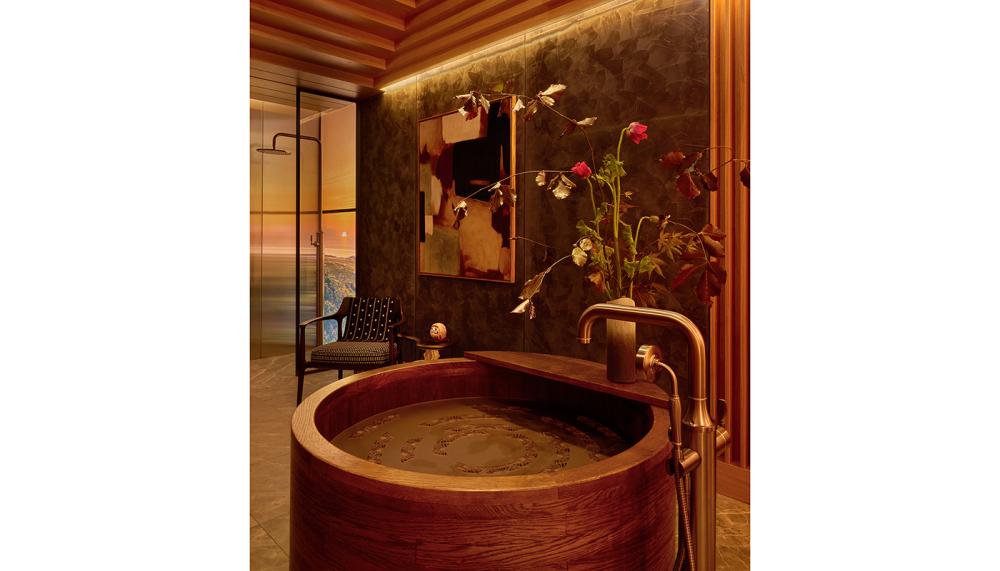 Samuel Heath's freestanding Bath Tap is shown with an Ofuro oak bathtub