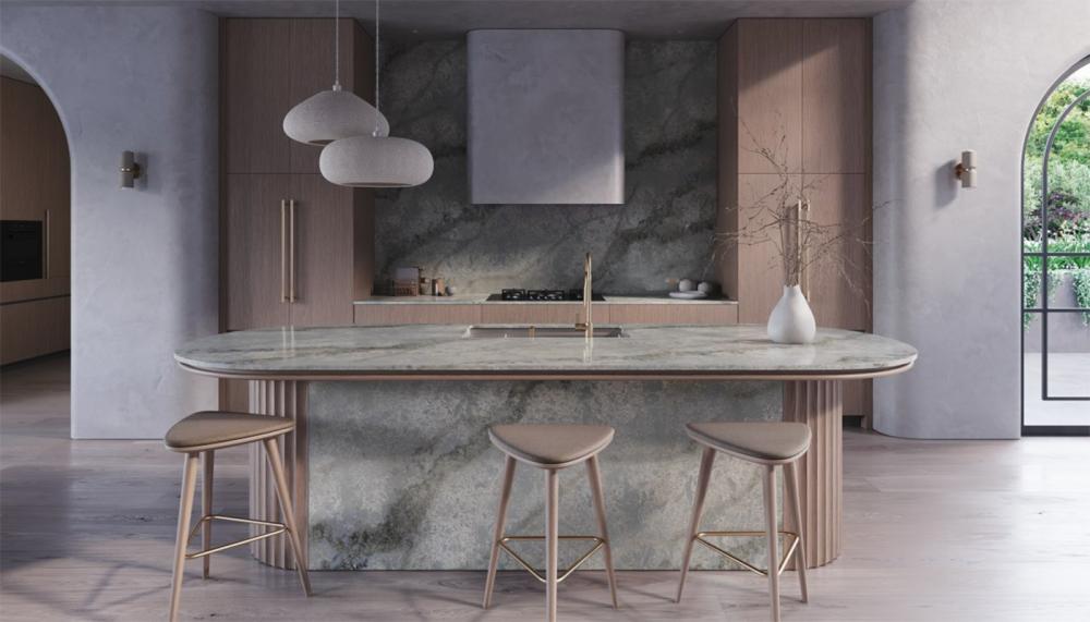 This island showcasing 8477 Ocean Sage, ICON by Caesarstone elegantly softens the space with its rounded edges and creates the feeling of easy kitchen movement