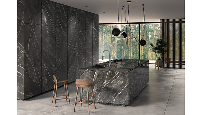 The versatility of Laminam is realised in this image marrying wall and island cladding to create a stunning and unified space