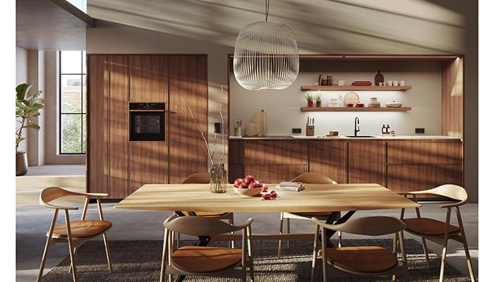 Smala WN Walnut by Rotpunkt introduces a new set of walnut veneer shaker doors with 12mm thin solid walnut frame, which are cleverly designed to complement built-in appliances, drawer solutions, and wall shelving