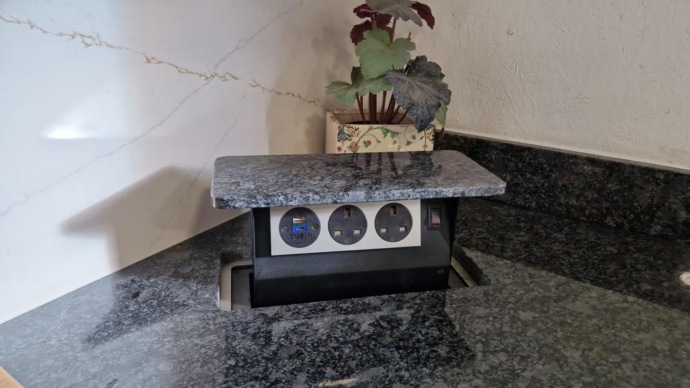 The S-Box shown in a worktop from Affordable Granite