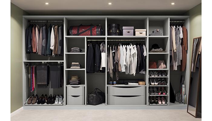 A luxury walk-in wardrobe and dressing area from Crown Imperial Shenaya Shaker bedroom collection in a linen finish creating a dedicated space where everything is beautifully organised and easily accessible. It’s available in a mixed palette of 22 neutral and vibrant painted colours, with over 70 handle options