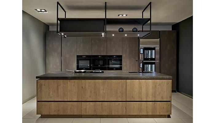 Eggersmann E4.0 wood veneer island and Dark Steel tall units with Miele and Unox ovens and Novy extractor
