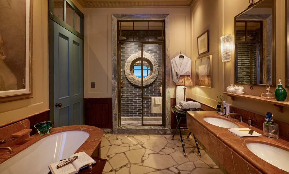 Ca' Pietra's WOW!house 2026 bathroom feels instantly richer with the introduction of red marble tiles